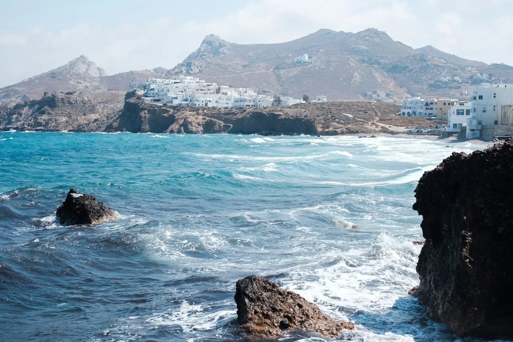Blue Aegean water and rocky coastline on Naxos